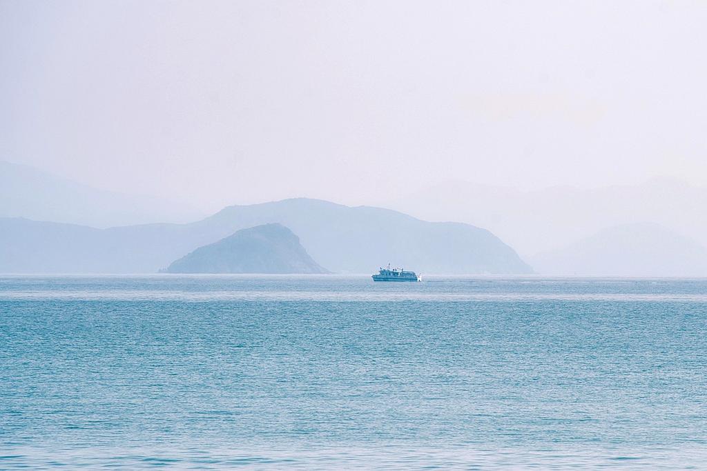 Panoramic view of a famous travel destination with mountains and clear sky