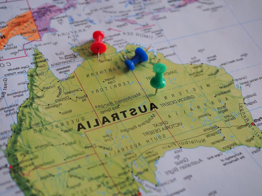 Traveler consulting maps and documents